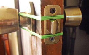 Keep Doors From Shutting using an Elastic Band