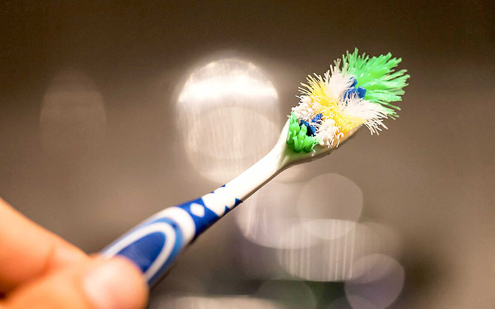 10 Surprising Things You Can Clean With Your Old Toothbrush cleaning hacks  filtering system  vinegar  garbage disposal  hair dryer  hair products  toothbrush