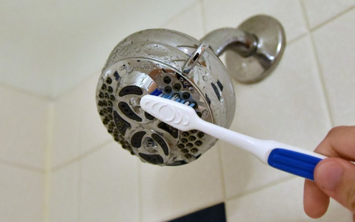 Shower Head cleaning hacks  filtering system  vinegar  garbage disposal  hair dryer  hair products  toothbrush