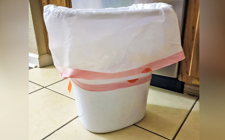 Layer Up Your Trash can  quick cleaning tips  cleaning hacks  household tips  and tricks  dish soap  baking soda  white vinegar  hydrogen peroxide  cleaning supplies pet  bacteria  microwave  microwave  toilet bowl  trash bag  trash can  toilet  how to clean the floor with  
